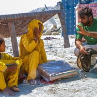 Blanket for a Needy Family Abid gives a mosquito net and a blanket to victims of historic flooding in Pakistan, saying, "Trust in Jesus, He loves you and He will provide."