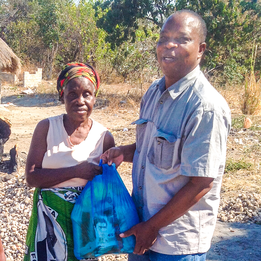 Evangelistic Outreach Eugene Kalunga doing outreach in a village