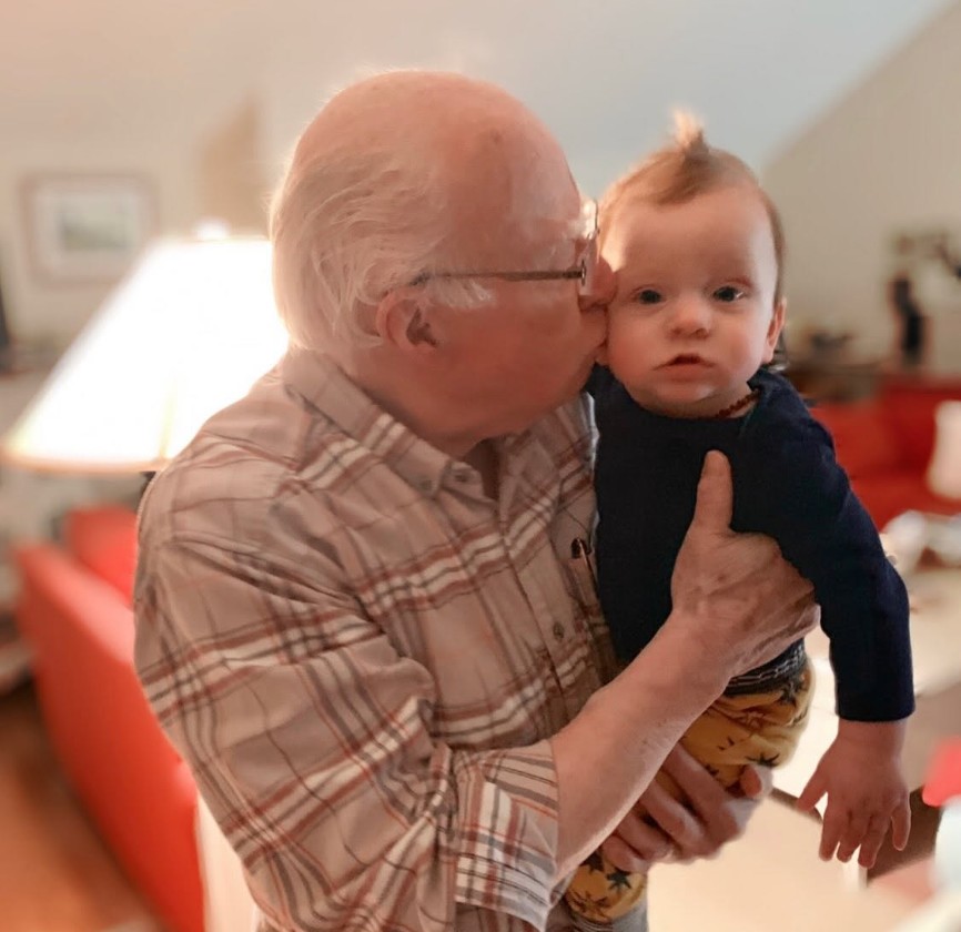 Bob Evers with a grandchild