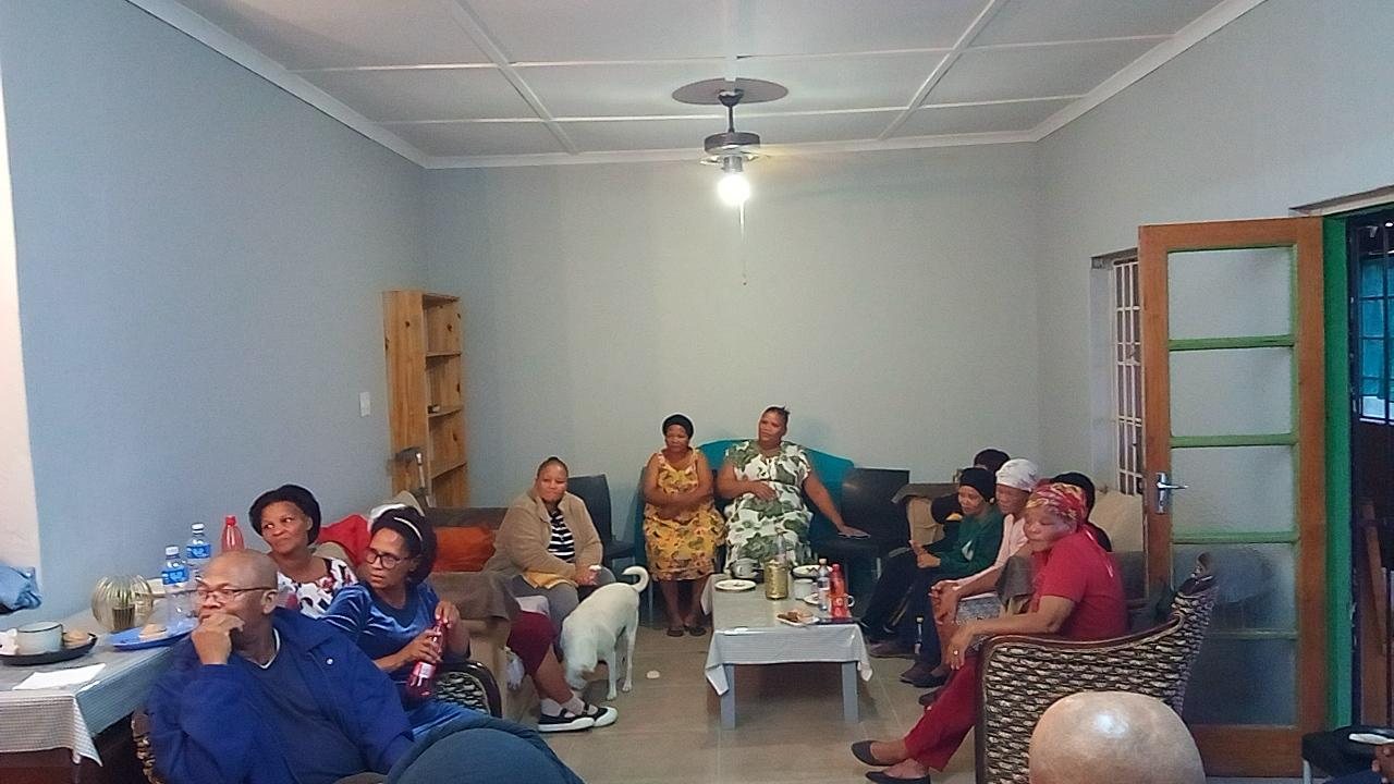 Community leaders in the remodeled reception room at the Onseepkans Mission