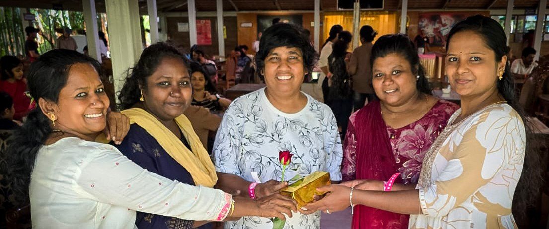 Taru Raj Kumar (center) with women from Deepam in India